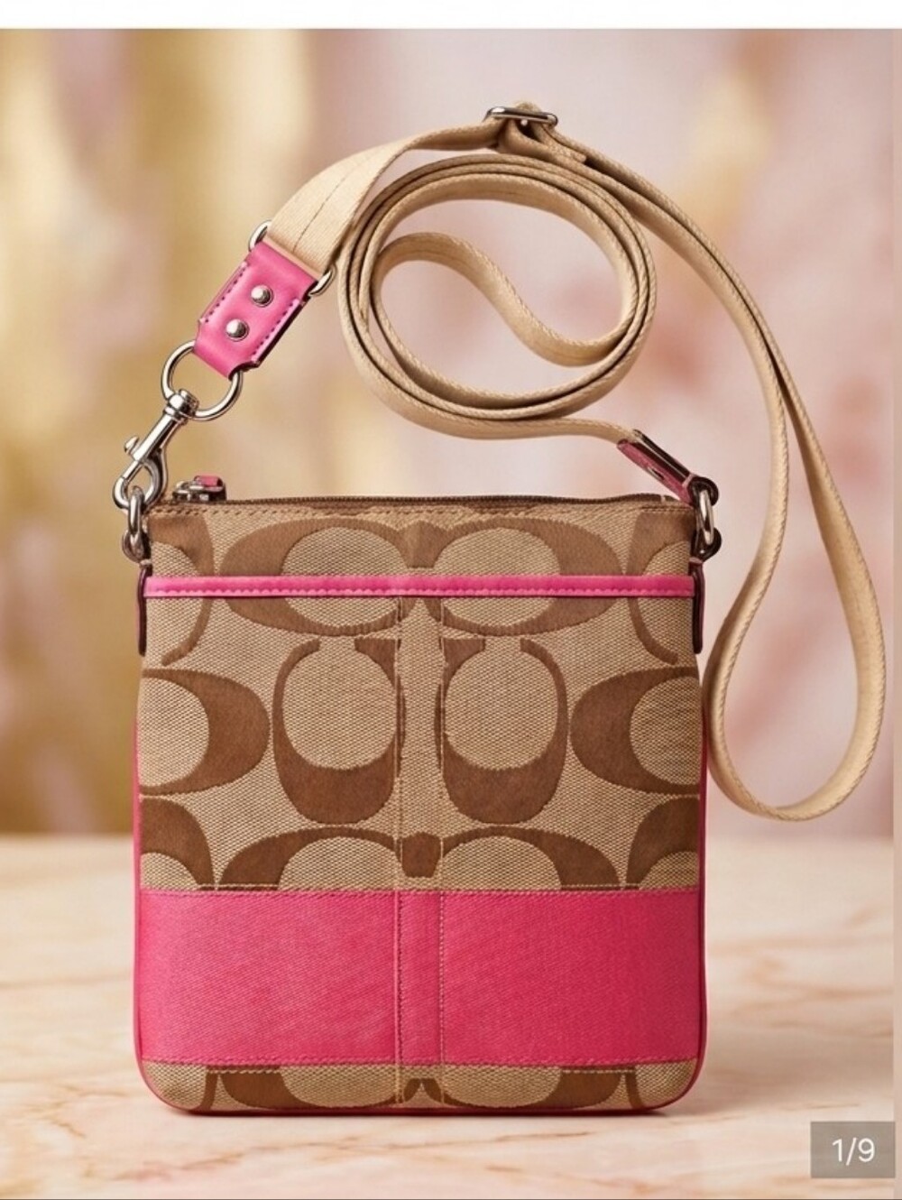 COACH designer logo swingpack crossbody tan and hot pink